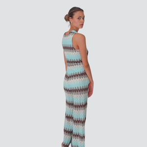 Tensione in tuta fantasia filo lurex con cinturina 48% cotone Art S25UG56
