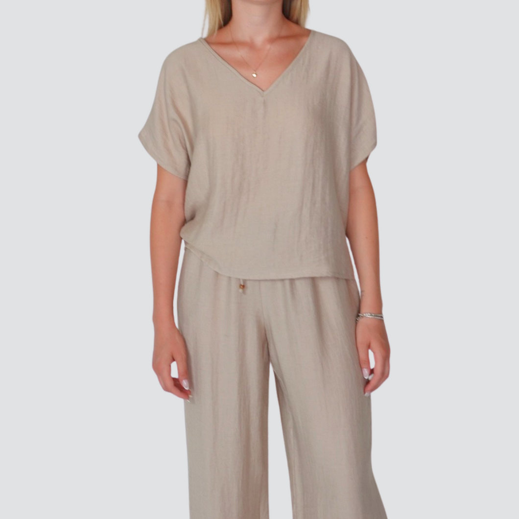 Tensione in blusa over scollo V 67% viscosa 11% lino Art 25C7935