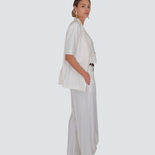 Carica l&#39;immagine nel visualizzatore di Gallery, Tensione in pantalone goffrato con cintura 84% viscosa Art 25P7772
