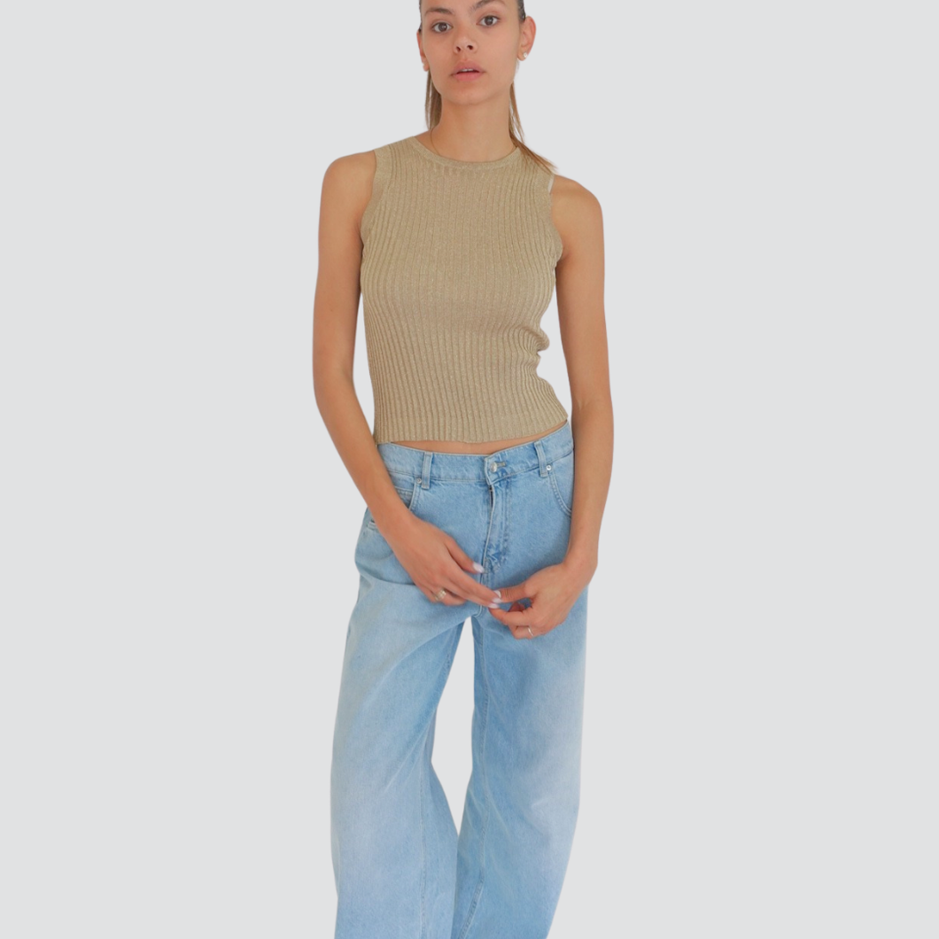 Tensione in maglia costina lurex senza maniche scollatura schiena 70% viscosa Art D75546