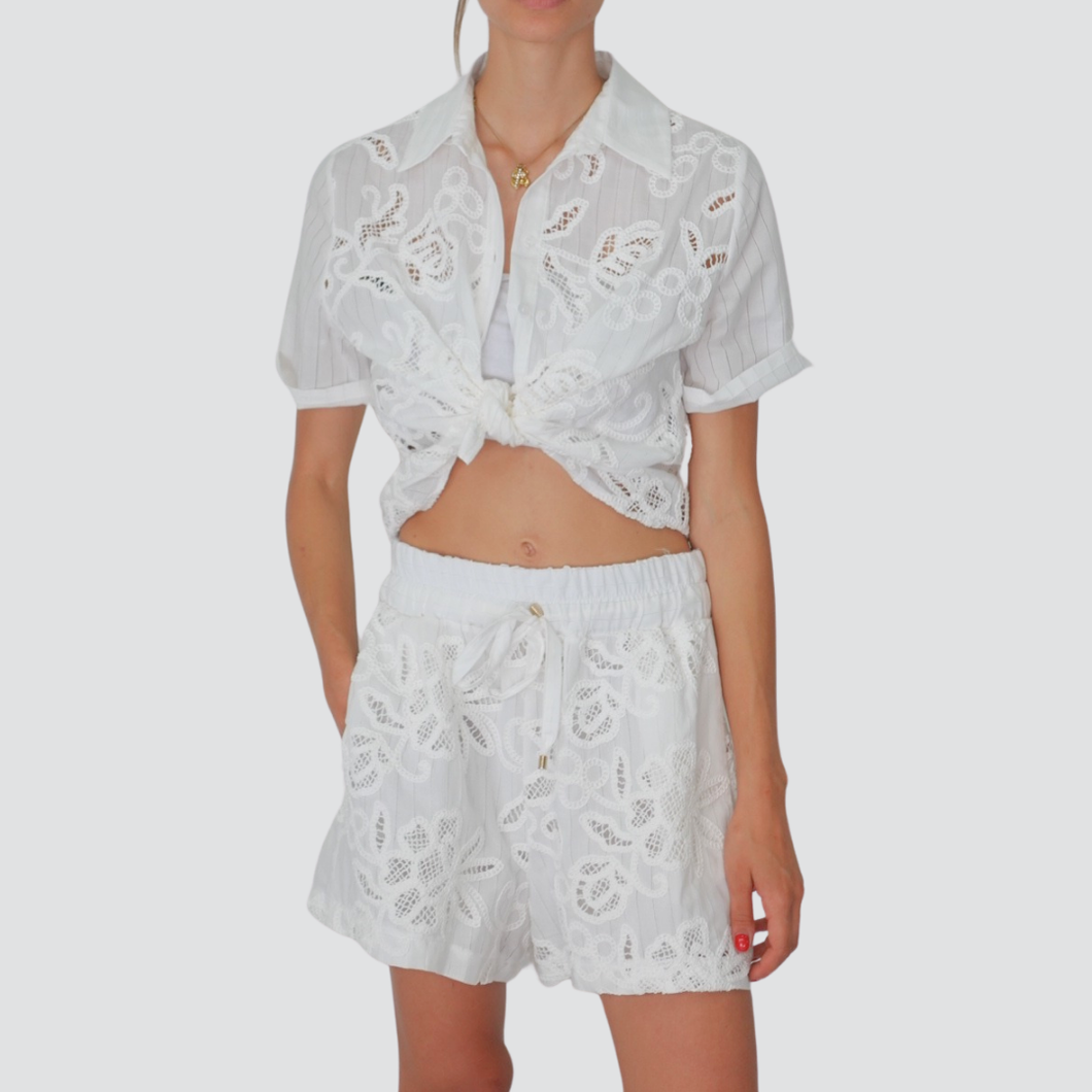 Tensione in camicia gessata con ricami 100% cotone Art S25CF31