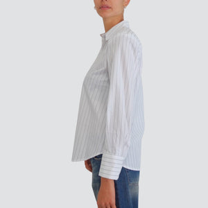 Tensione in camicia gessata con spaliini 60% cotone Art W25C719